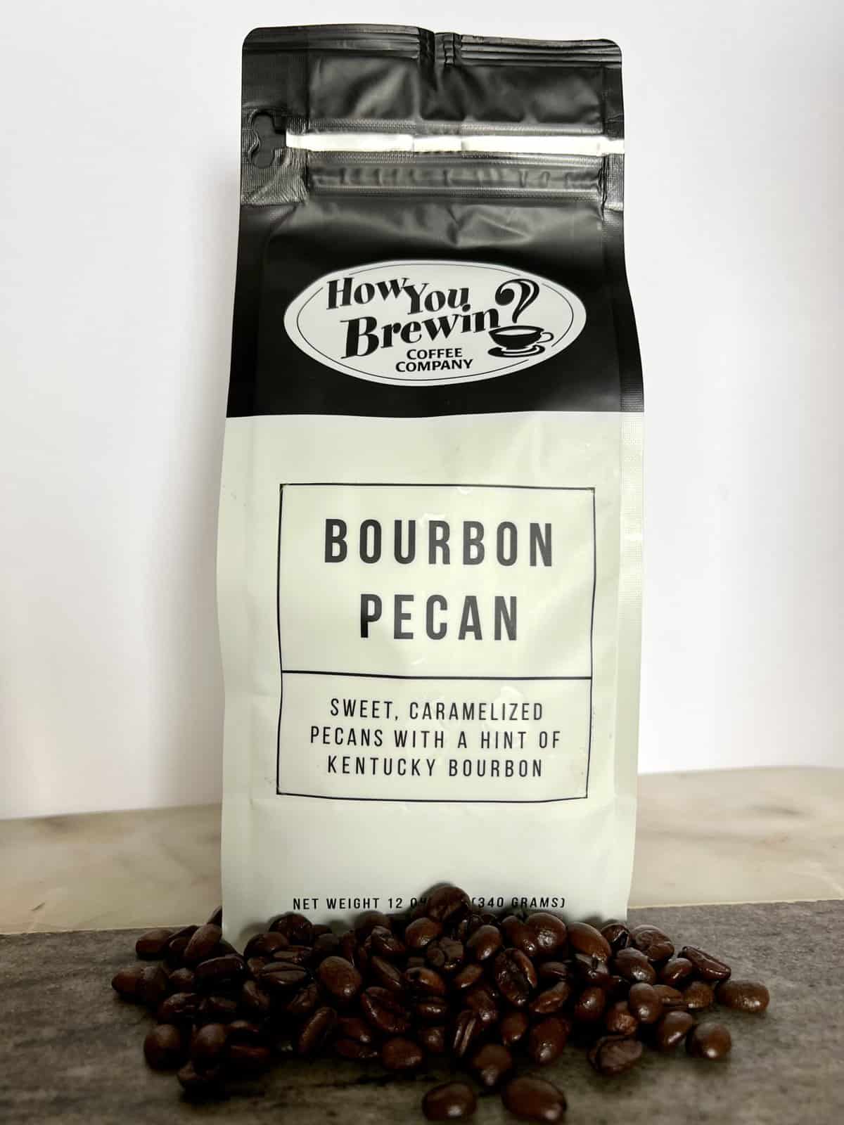 How You Brewin Coffee Subscription Review: Flavorful Brews 12 Bourbon-Pecan-coffee-packaging-stands-on-coffee-beans-scaled