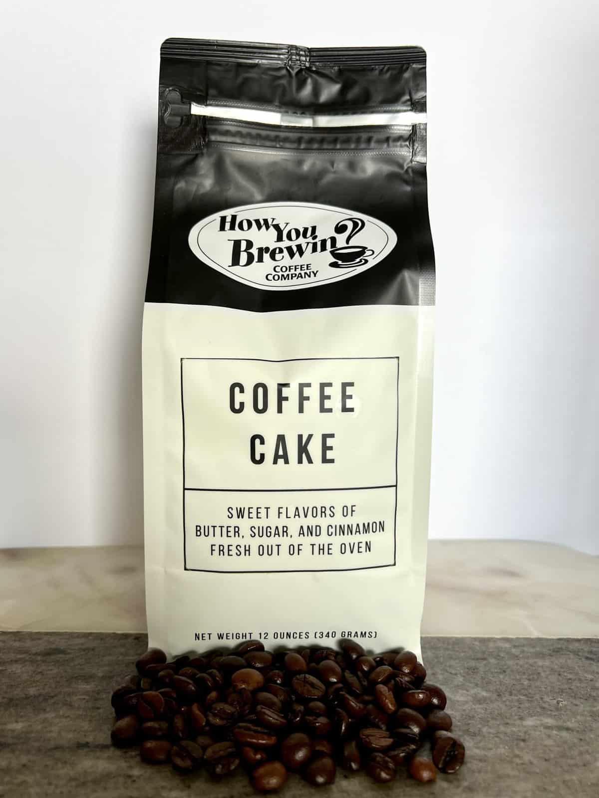 How You Brewin Coffee Subscription Review: Flavorful Brews 15 Coffee-Cake-coffee-packaging-stands-on-coffee-beans-scaled