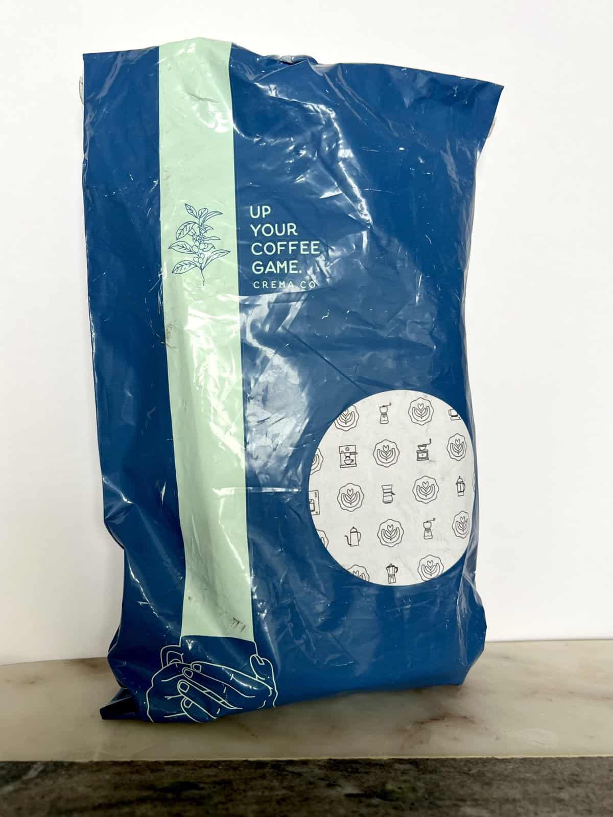 Crema Coffee Subscription: Everything You Need To Know 3 Crema Co Coffee blue bag "Up Your Coffee Game"