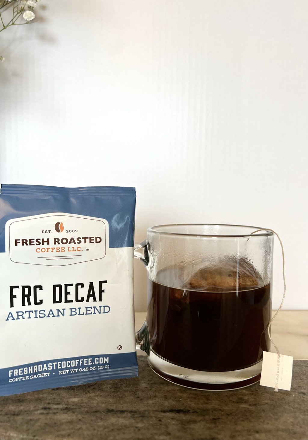 Fresh Roasted Coffee Subscription Review & Photos For 2024 9 FRC Decaf Artisan blend coffee next to the cup