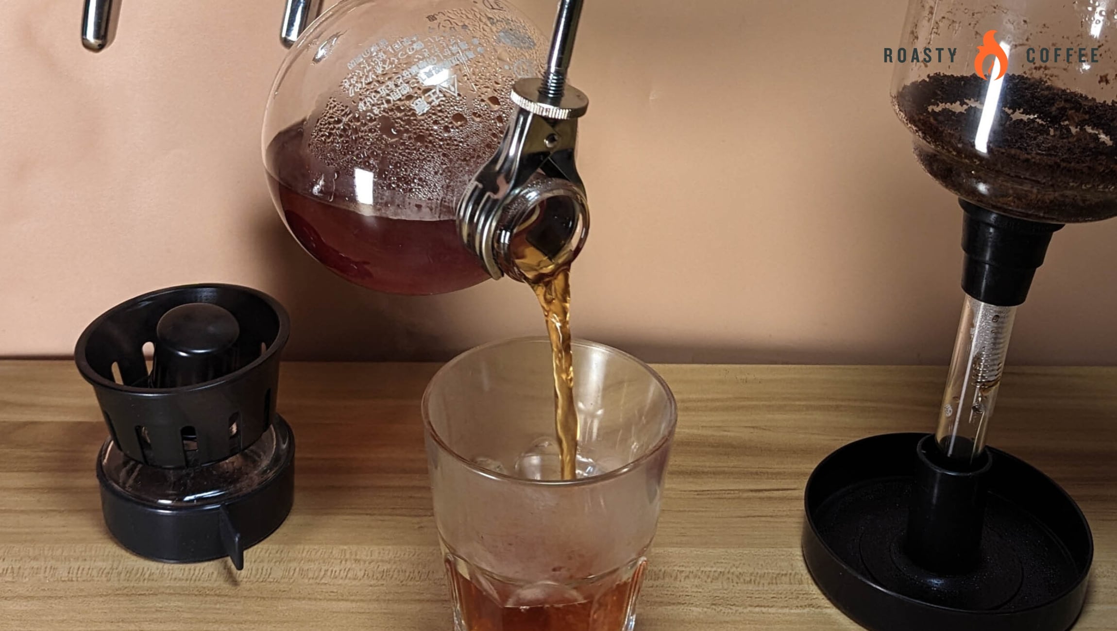 Our Hario Syphon Review: The Coffee Maestro’s Choice 14 Hario Syphon Pouring