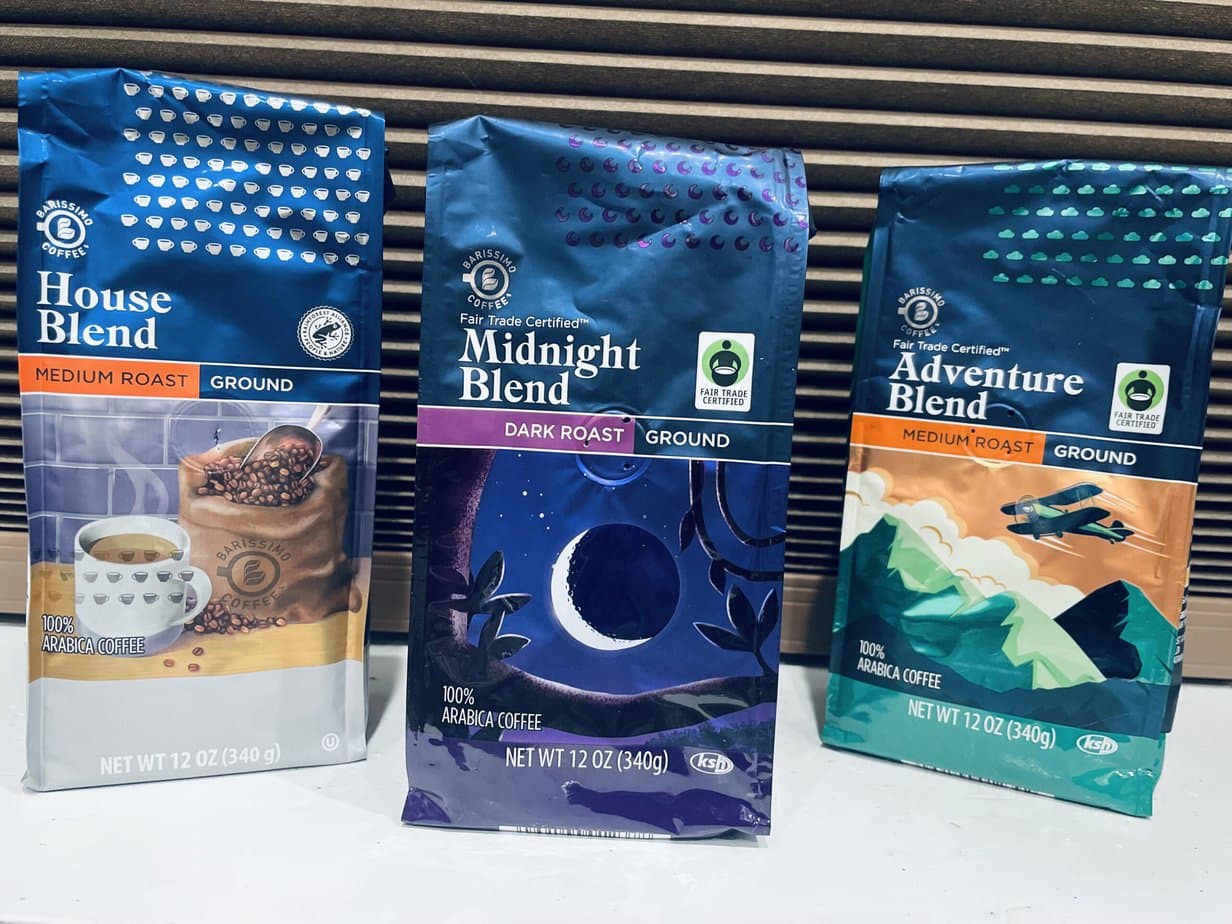 Midnoght blend, Adventure blend, House blend coffee packs on the white table 