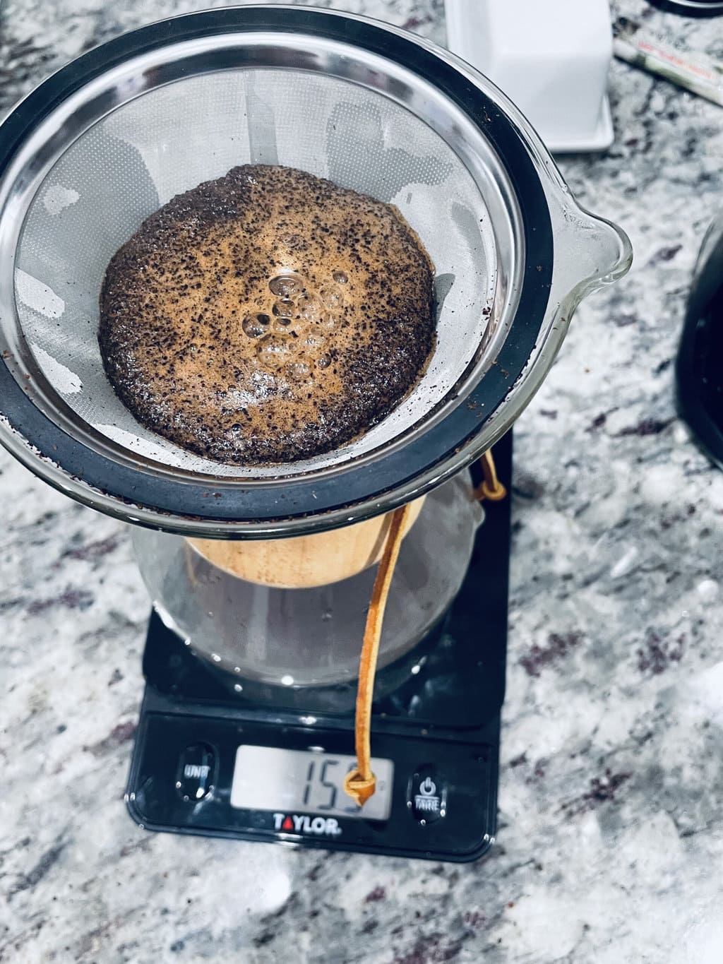 filtering coffee in Chemex coffee maker