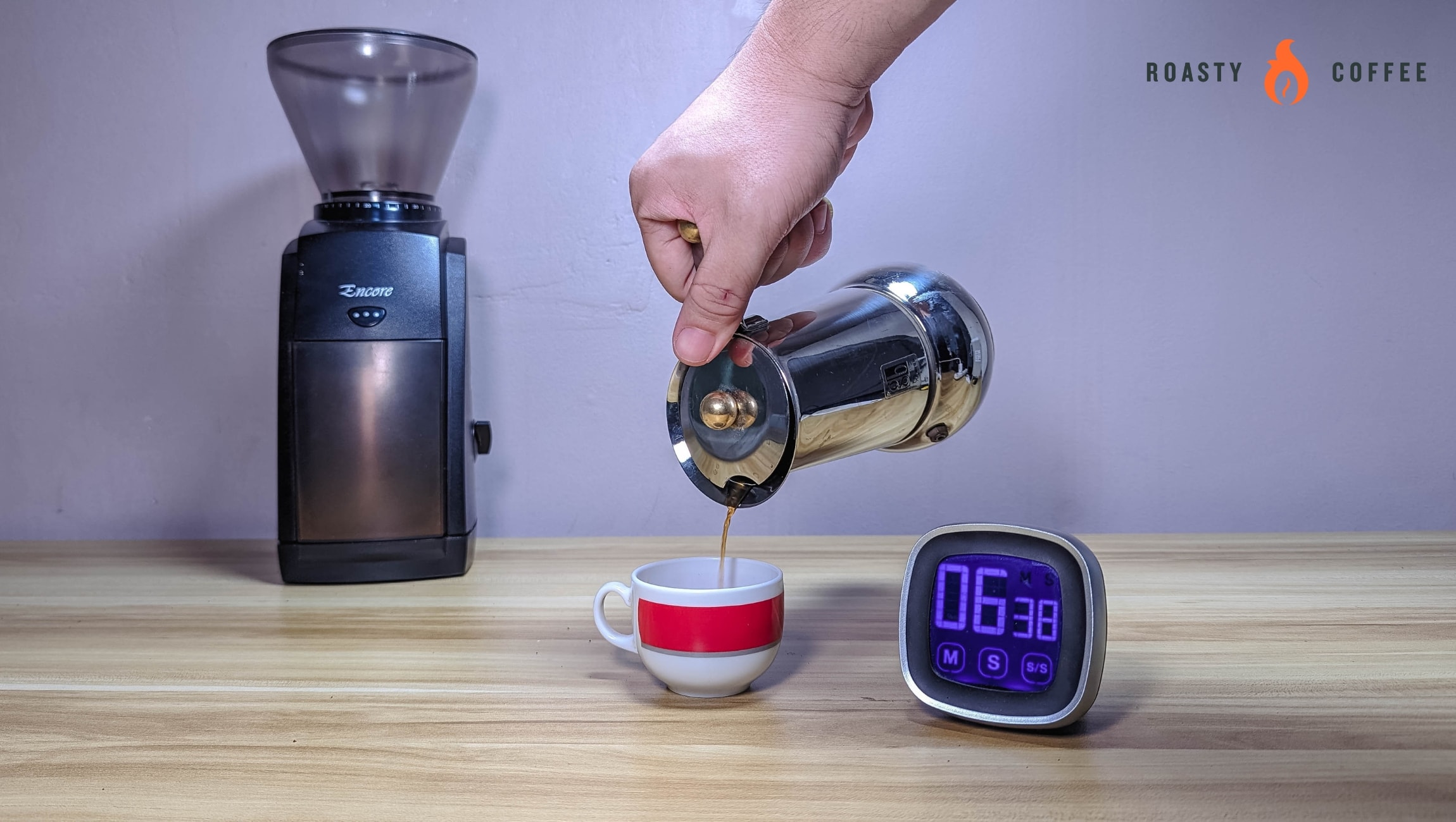 Which Coffee Method Takes Longest? We Timed Them All! 9 Pouring brewed coffee from Moka Pot into cup