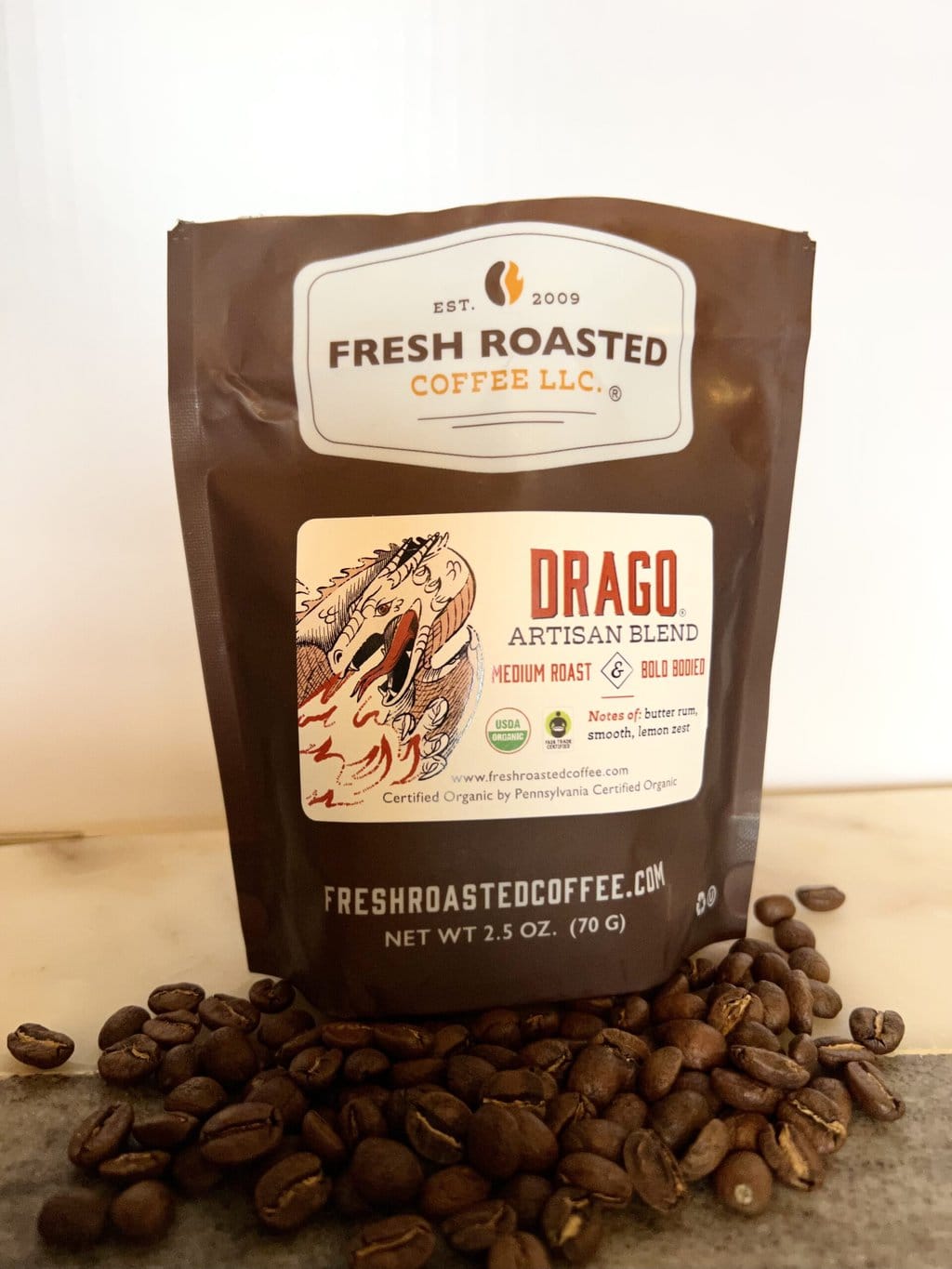 Fresh Roasted Coffee Subscription Review & Photos For 2024 30 Organic Drago next to coffee beans