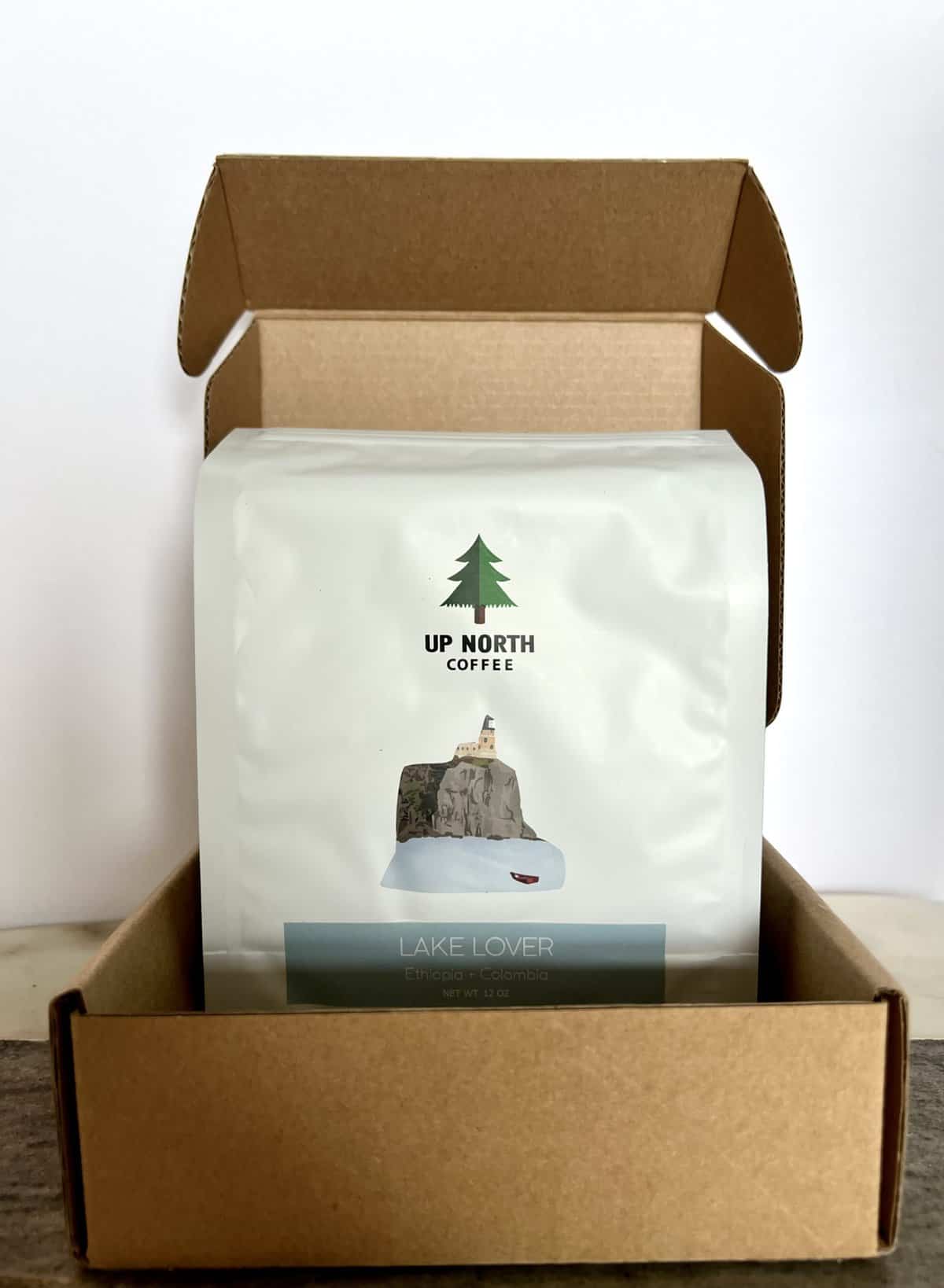 Packaging-of-Up-North-Coffee-in-a-shipping-box-scaled