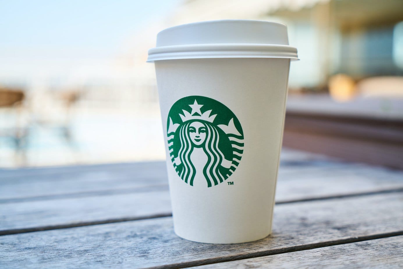Paper cup with a Starbucks logo