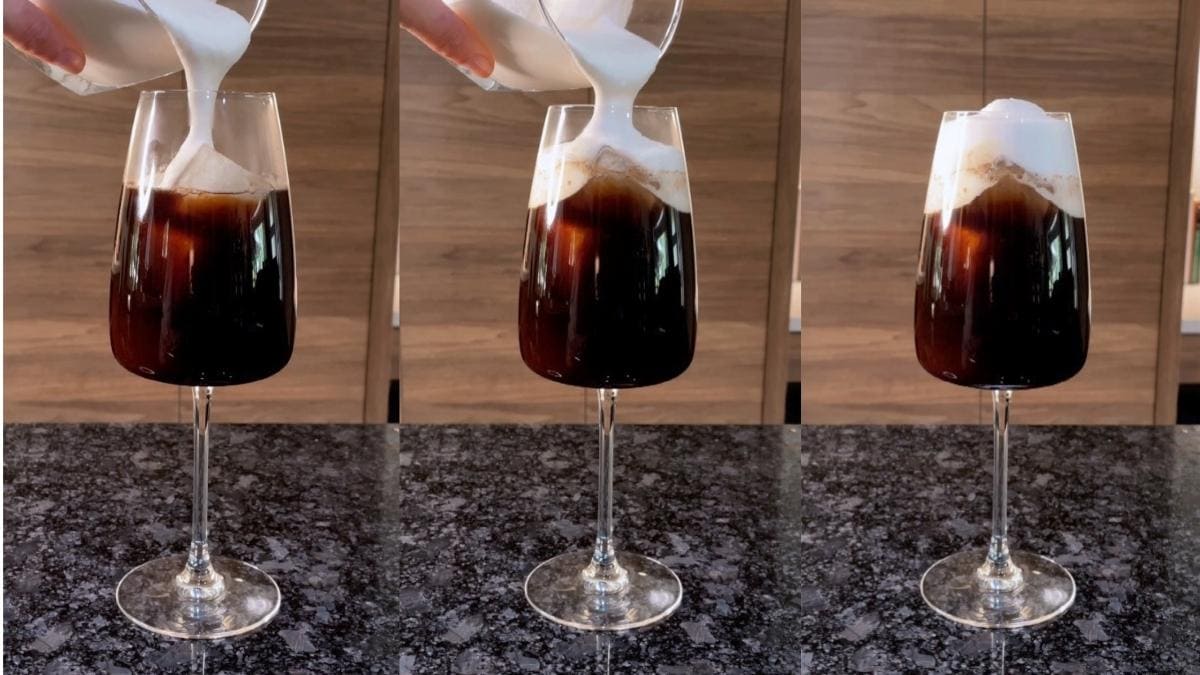 Topping the flavor-infused cold brew with the sugary cream