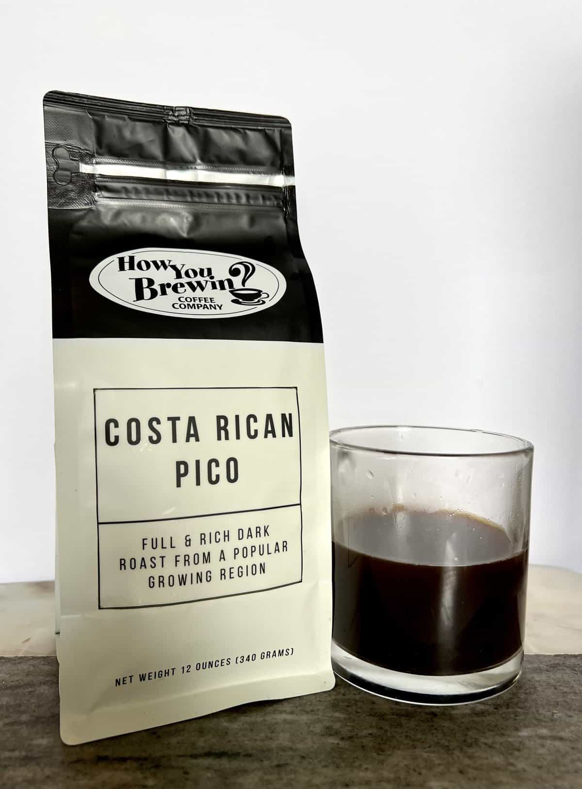 How You Brewin Coffee Subscription Review: Flavorful Brews 10 a-pack-of-Costa-Rican-Pico-coffee-stands-next-to-a-brewed-cup-of-coffee-scaled