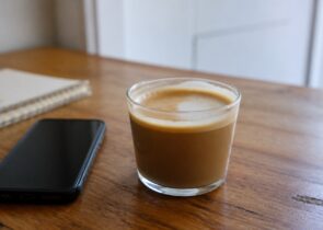 Generic coffee drink on a simple table for a coffee shops article