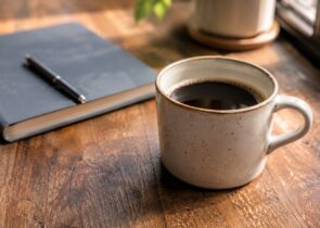 Generic coffee drink on a simple table for a coffee shops article