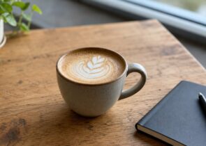 Generic coffee drink on a simple table for a coffee shops article
