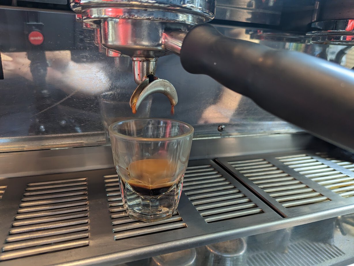 brewing a cup of espresso