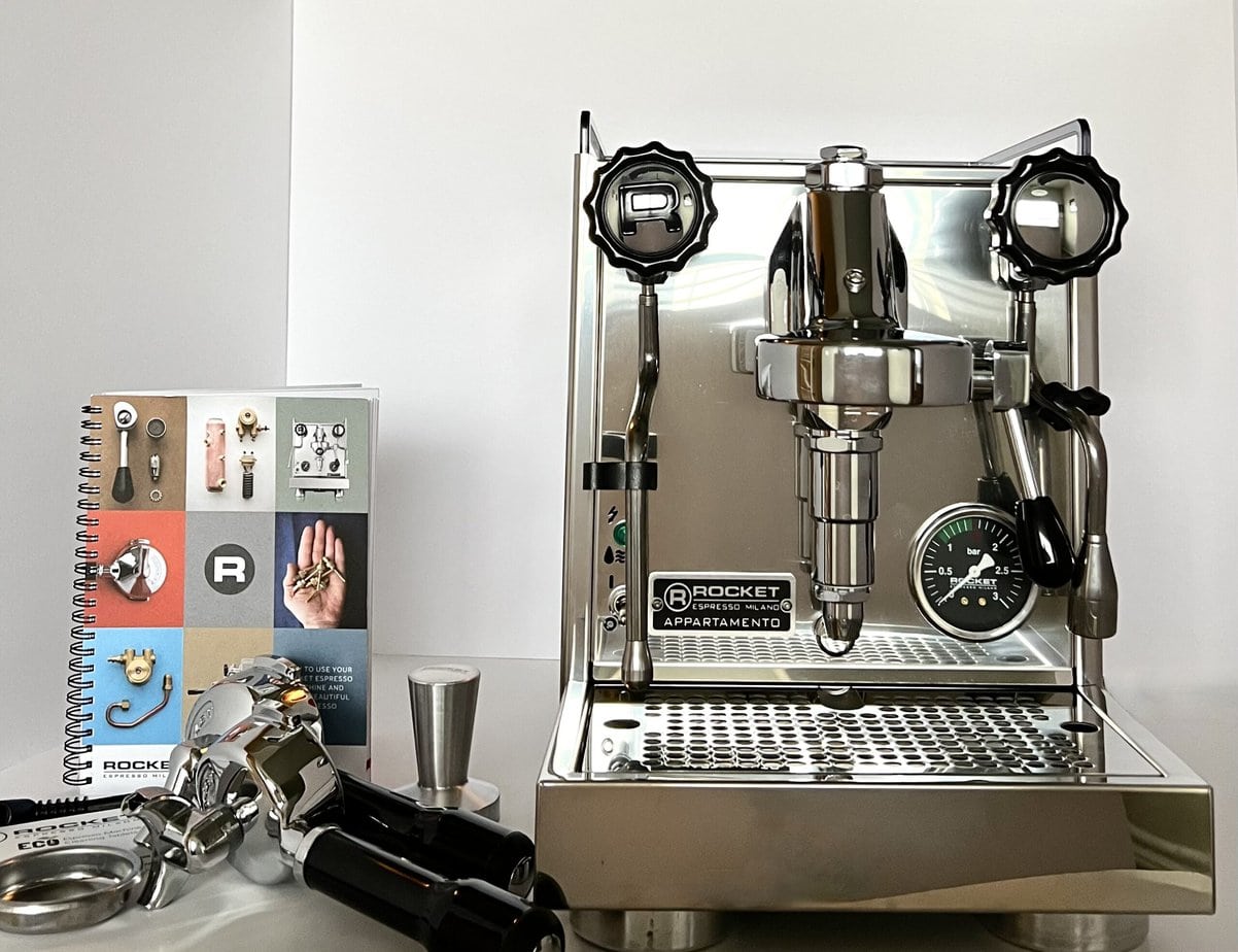 coffee machine Rocket Espresso Appartamento with accessories on the table