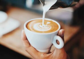 Milk pouring into latte