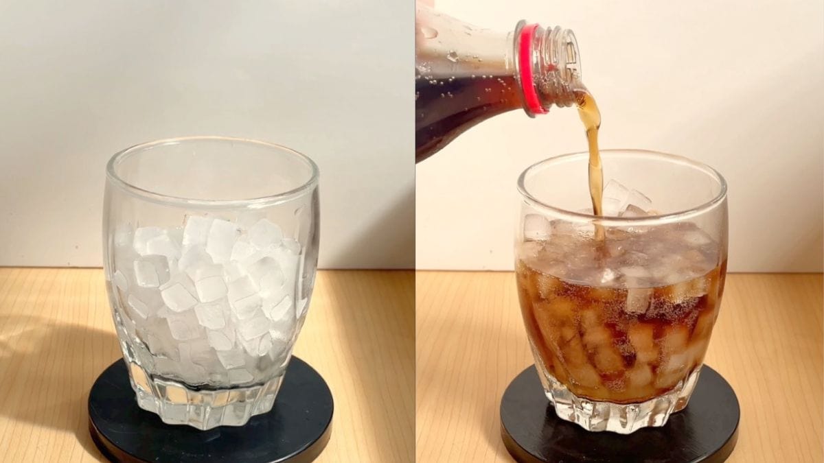 putting a few ice cubes into a glass and pouring in a refreshing Coca-Cola 