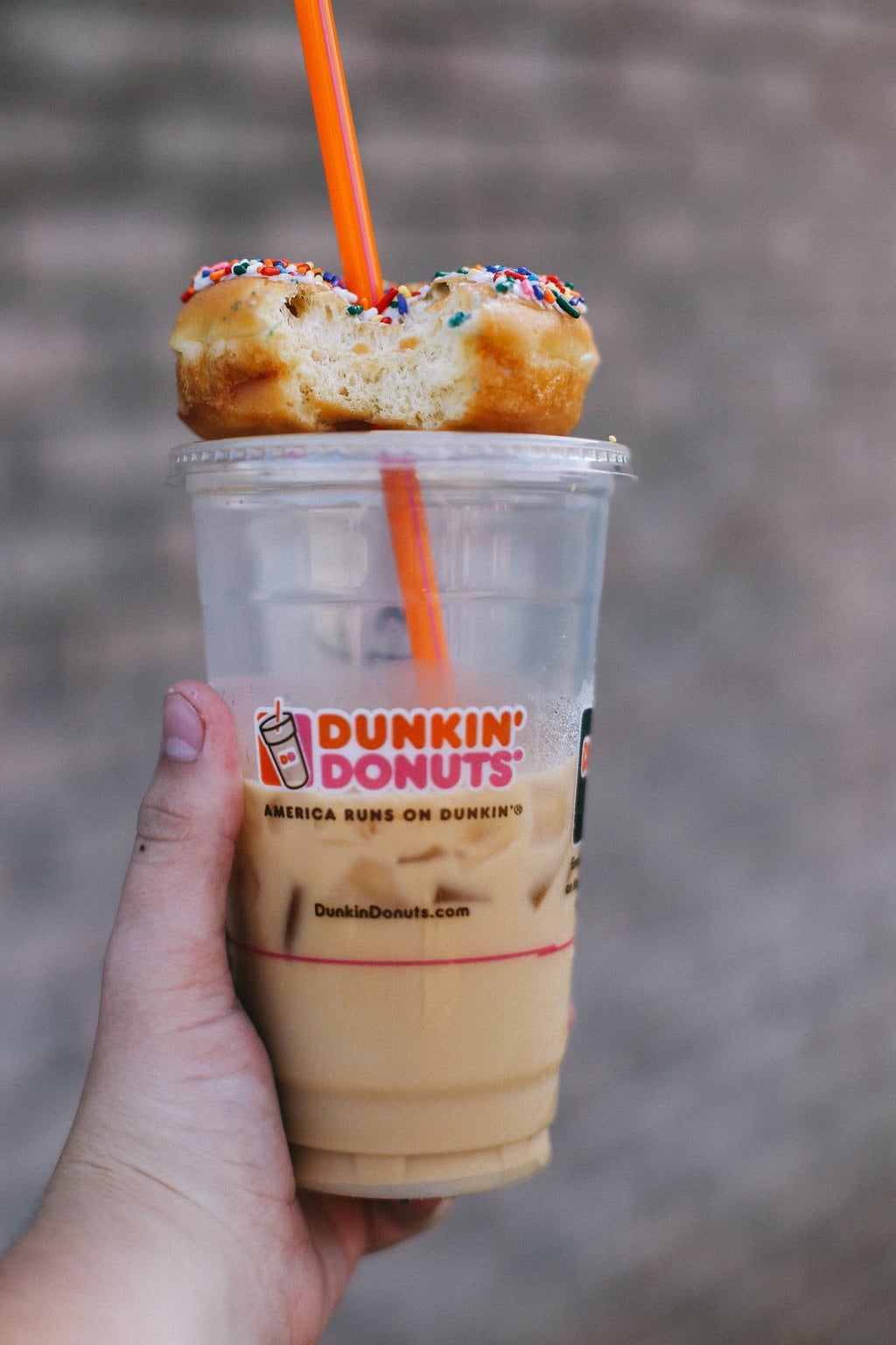 iced coffee drink and dunkin donut