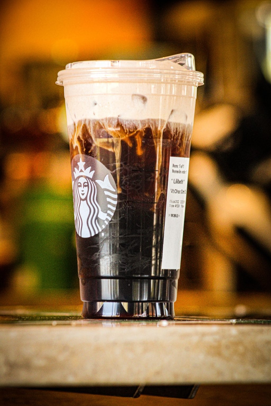 Starbucks black coffee drink in a transparent glass
