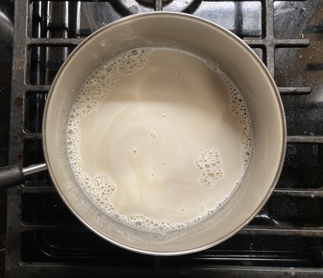 milk and brown sugar in a saucepan on the stove