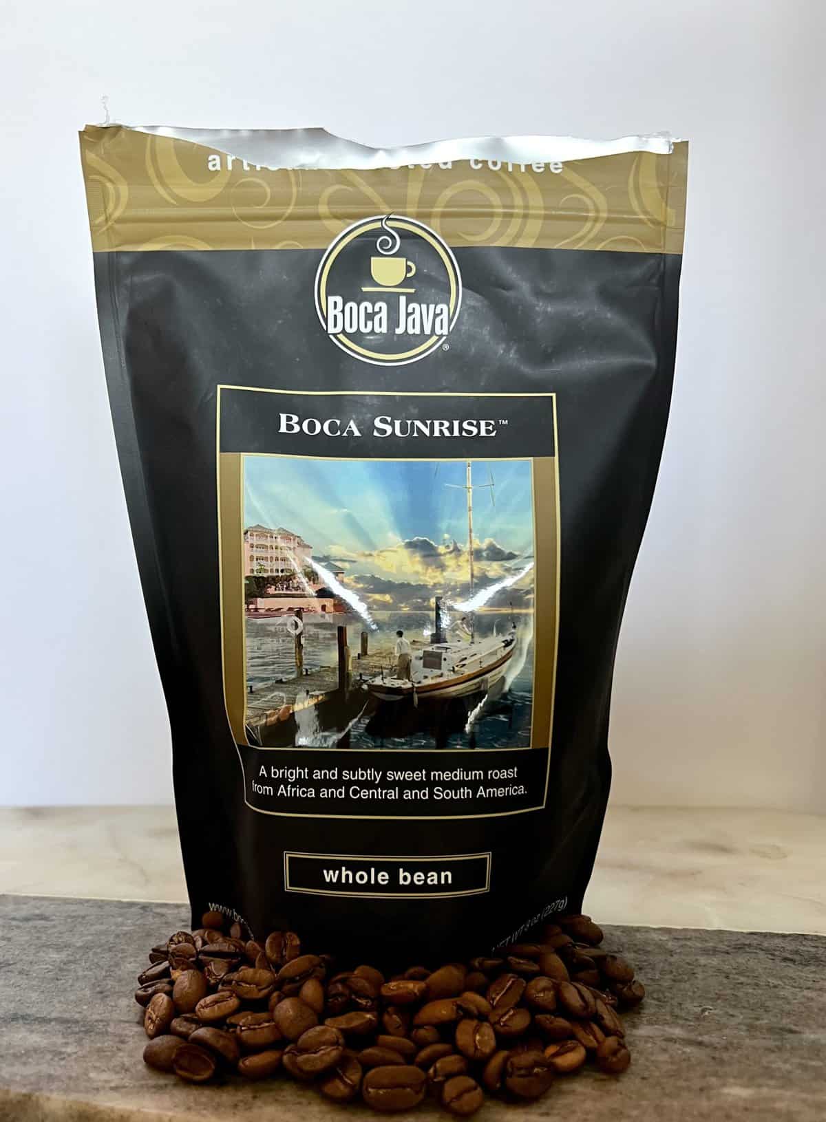 Boca Java Subscription Review: Specialty Flavored Coffees 5 open-packaging-of-Boca-Sunrise-coffee-stands-on-coffee-beans-scaled