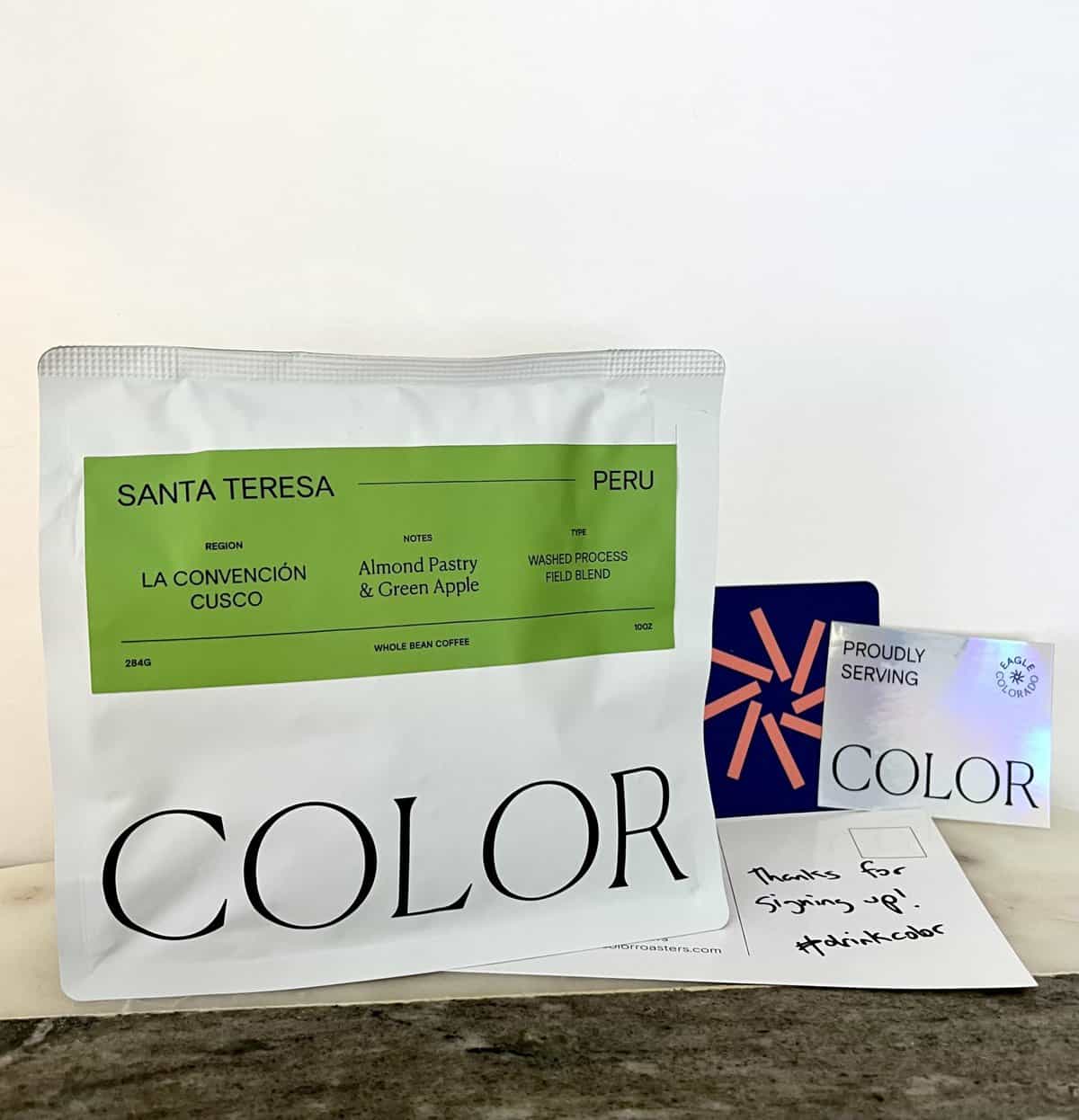 Color Coffee Roasters Subscription Review: Taste the Rainbow 4 packaging-of-Santa-Teresa-Peru-coffee-a-funny-postcard-and-a-couple-of-stickers-scaled