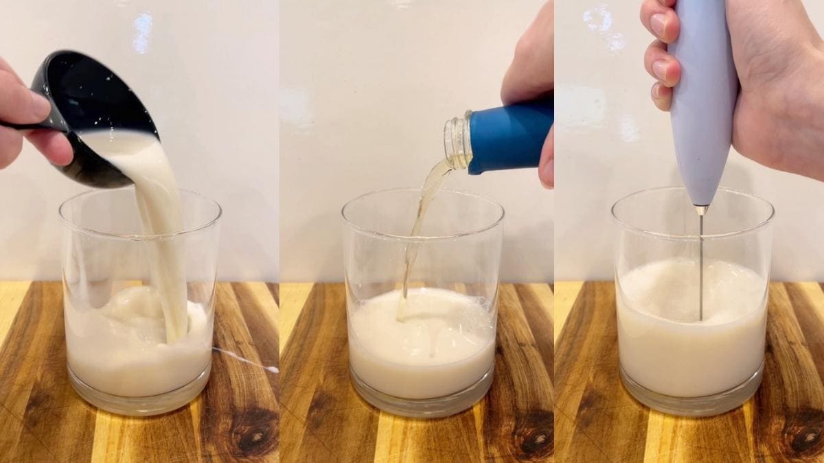 pouring creamer, vanilla syrup, and a pinch of salt into a frothing pitcher and mixing the ingredients with an electric frother