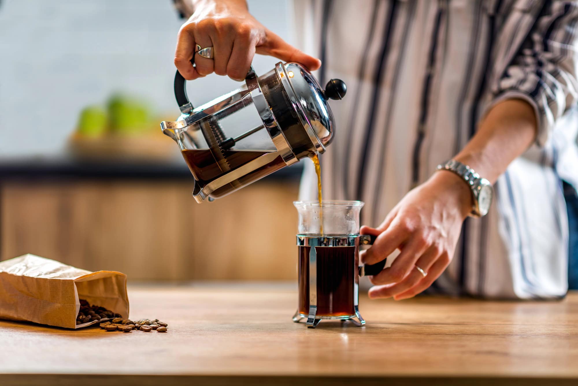 The Best Coffee Brewing Method For Every Zodiac Sign 11 Woman preparing coffee in French press