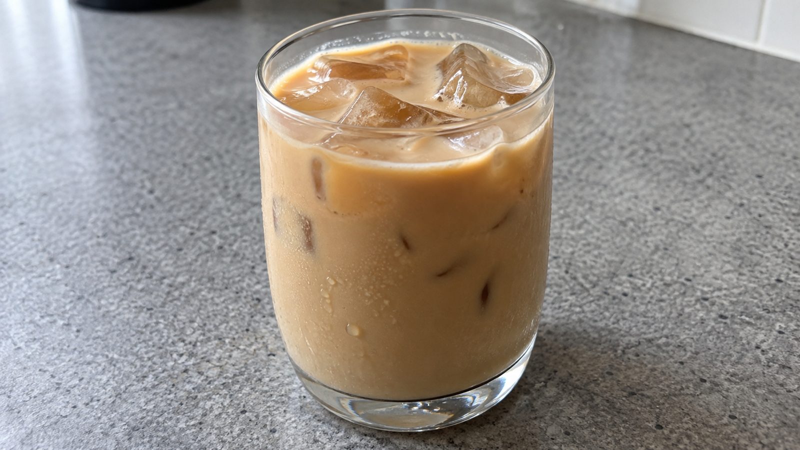 7 Homemade 7 Brew-Inspired Coffee Drinks 13 Homemade salted caramel white chocolate iced breve in a clear glass